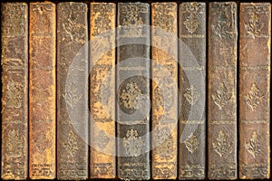 Row of ancient medieval weathered books