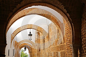 A row of arcades located along Chateau street inside the medina of Tunis, Tunisia