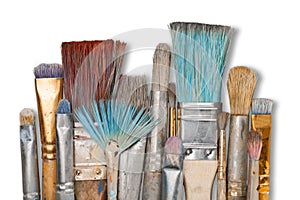 Row of artist paint brushes on background