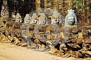 Row of asuras, or demons, at Angkor Thom Cambodia