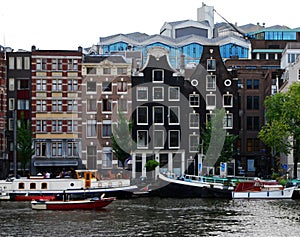 Row of authentic canal houses in Amsterdam, The Netherlands