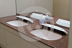 Row of automatic faucets