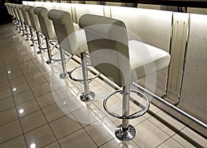 Row of bar stools photo