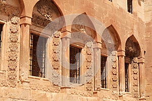 Row of barred windows in original ottoman architecture inside of the Ishak Pasha Palace, Sarayi, Dogubeyazit, Turkey