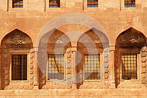 Row of barred windows in ottoman architecture inside of the Ishak Pasha Palace, Sarayi, Dogubeyazit, Turkey