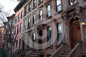 Row of Beautiful Old Brownstone Homes in Prospect Heights of Brooklyn New York with a Christmas Wreath