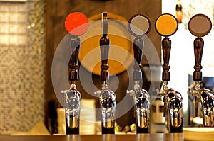 Row of Beer Taps in Bar