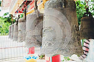 A row of Big brass bell