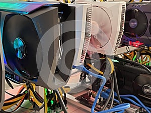 Row of bitcoin miners set up on the wired shelfs. Device for mining crypto currency. Mining cryptocurrency. Bitcoin farm