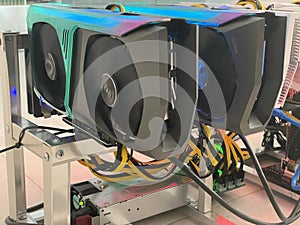 Row of bitcoin miners set up on the wired shelfs. Device for mining crypto currency. Mining cryptocurrency. Bitcoin farm