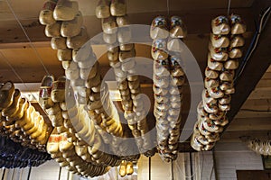 Row of blank new wooden Dutch clogs for sale on a market,Marken, The Netherlands