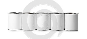 Row of blank paint cans on white background photo