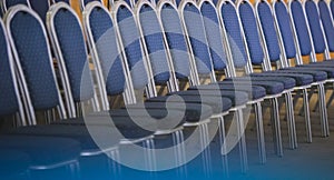 Row of blue conference chairs