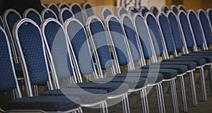 Row of blue conference chairs