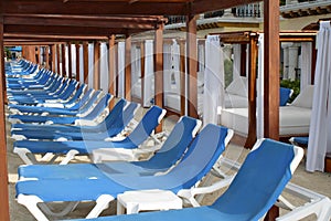 Row of blue deck chairs
