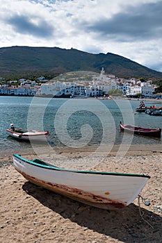 Row boat docked in cadaques sand beach