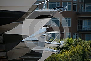 Row of boats on shelves  at boat storage near Edmond marina -2