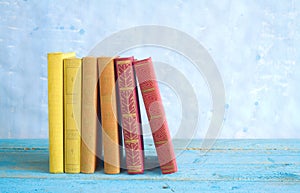 Row of books,blue background