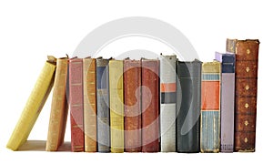 Row of books isolated on white background. Reading,literature,education,library,home office, back to school concept,copy space