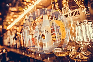 Row of bottles of alcohol in a bar or restaurant