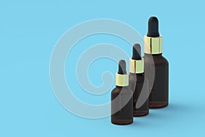 Row of bottles with essential oil on blue background. Copy space