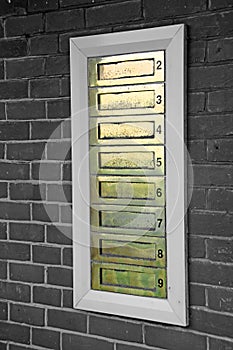 Row of brass letterboxes