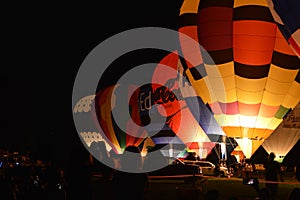 Row brlightly lit hot air balloons Boise Idaho 2019