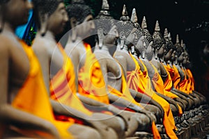 Row of Buddha Status at Wat Yai Chaimongkol, Ayutthaya, Thailand