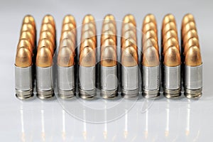 row of bullets 9mm parabellum FMJ (Full Metal Jacket ) photo