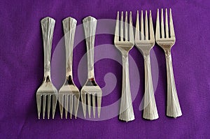 A row of cake forks