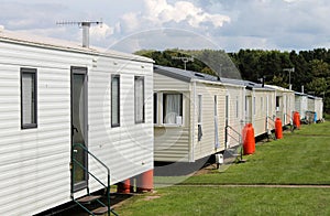 Row of caravan trailers in holiday park