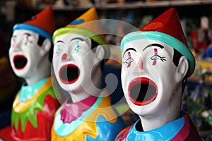 Row of carnival clowns
