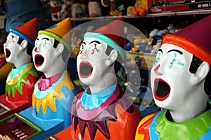 Row of carnival clowns