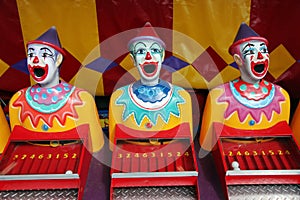 Row of carnival clowns