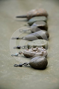 Row of Carp Fishing Tackle Lead Weights Equipment