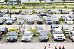 Row of cars on parking lot photo