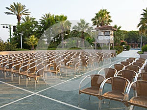 Row of chair seats in open air theater