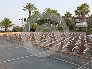 Row of chair seats in open air theater