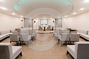 Row of chairs in boardroom. seats in an empty conference room