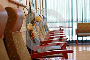 Row of chairs in a waiting room