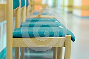 A row of chairs in a waiting room