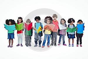 A row of children standing together reading books