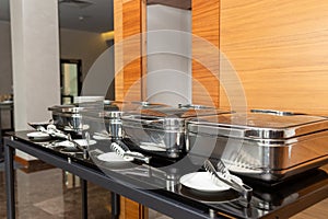 Row of closed chafing dishes