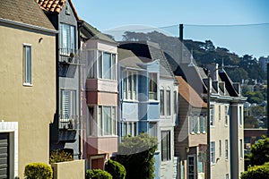 Row of colorful apartment buildings or town homes in San Francisco historic districts in the downtown city or in an