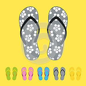 Row of colorful beach flip flops over color background