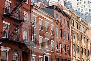 Row of Colorful Brick Residential Buildings in Chelsea of New York City