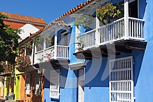 Row of colorful houses on a street of Cartagena de Indies of Colombia, South America.