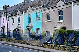 Row of colorful stucco townhouses