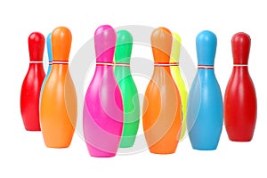 Row of colorful toy plastic bowling pins photo