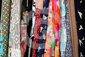 Row of Colorful Women`s Dress Fabric